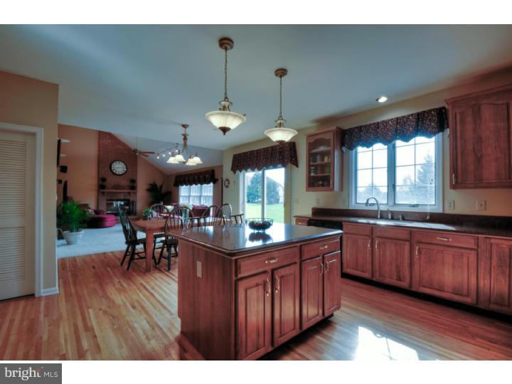 20 Zaitz Farm Road Princeton Junction, NJ 08550 - Photo 7 of 25 a kitchen with granite countertop a stove dining table chairs and granite counter tops