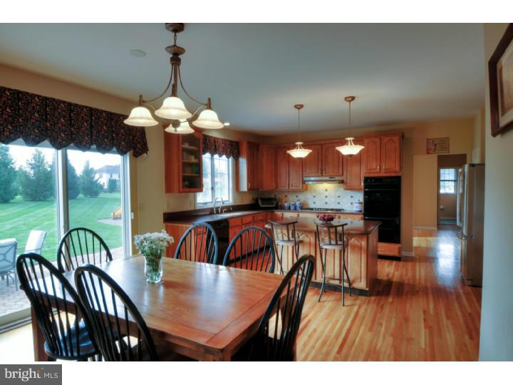 20 Zaitz Farm Road Princeton Junction, NJ 08550 - Photo 8 of 25 a view of a dining room with furniture window and wooden floor