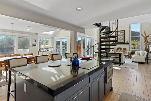 a view of a living room and dining room