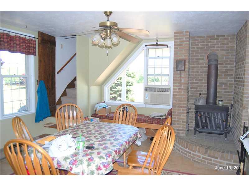 86 Meadow Road Burgettstown, PA 15021 - Photo 12 of 25 Dining Room. Butler stair case left background.