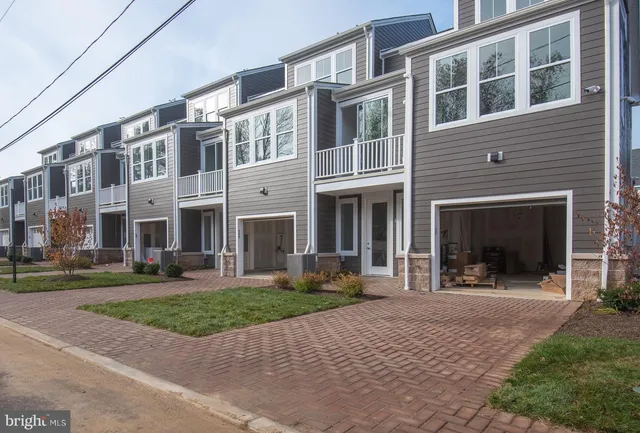 a view of a building with a yard