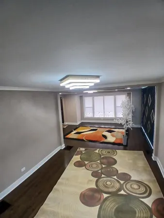 a room with furniture and pool table