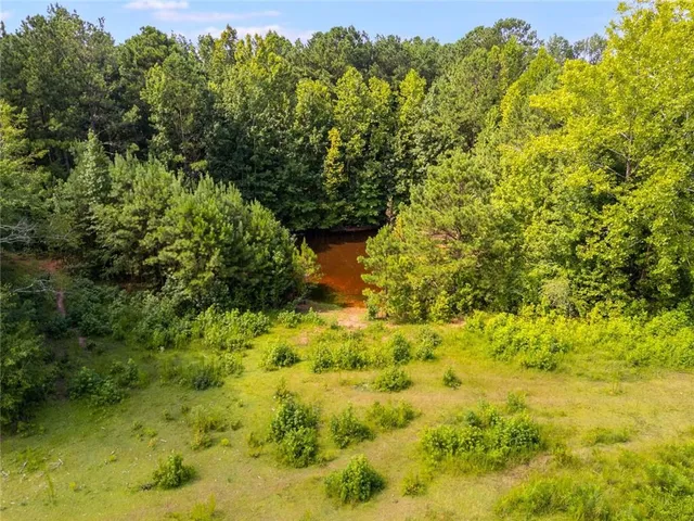 a view of a large yard with green space