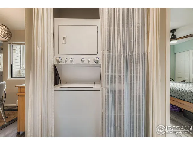 a view of bathroom with washer and dryer