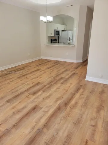 a view of a backyard of the house