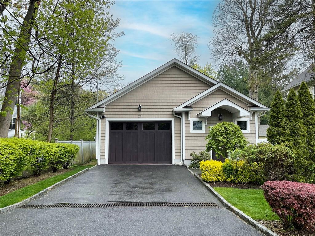 21 Palisade Road Rye, NY 10580 - Photo 1 of 1 a front view of house with yard and trees around