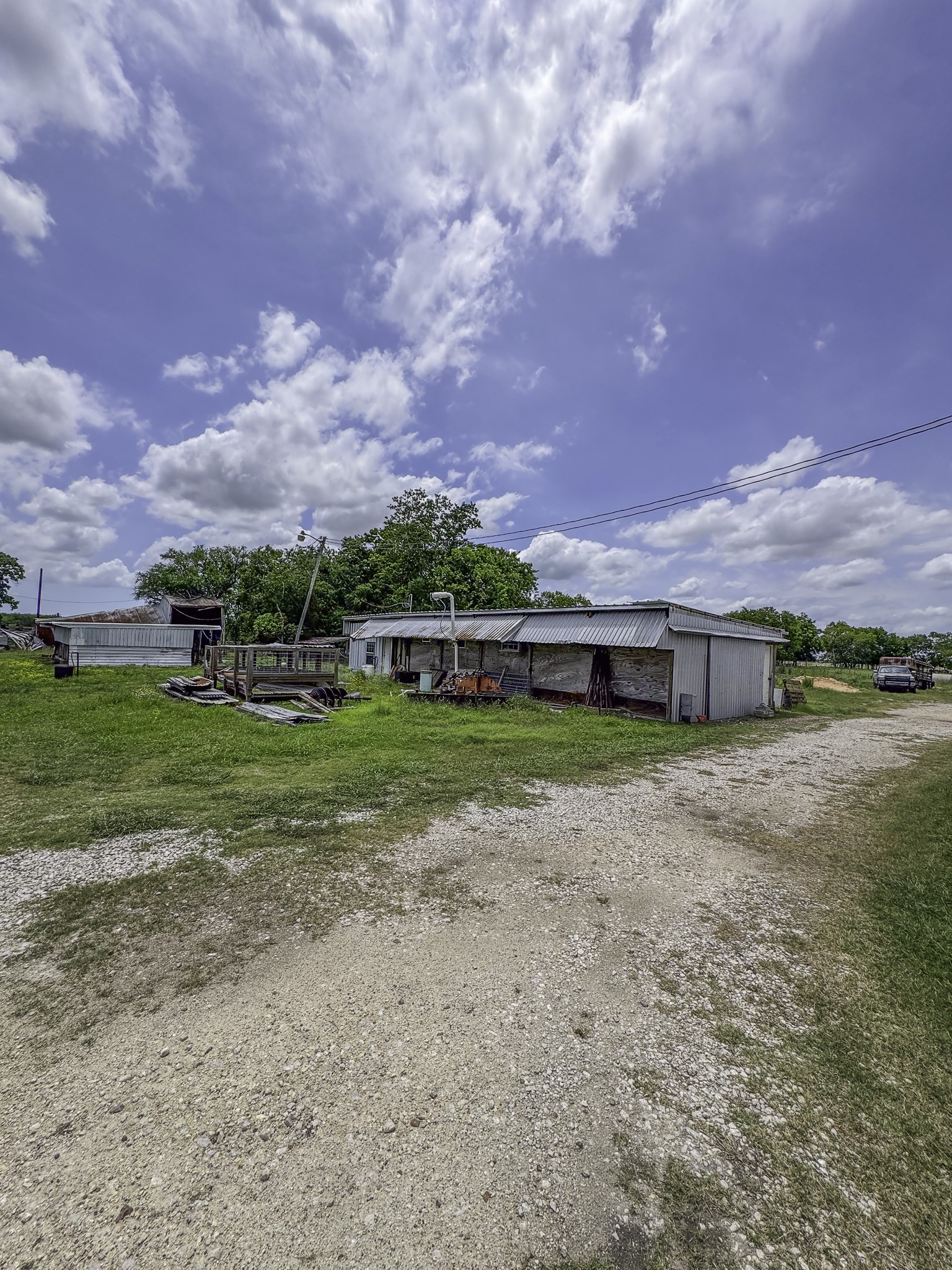 11810 Zamanek Road Needville, TX 77461 - Photo 21 of 30 a view of a house with a big yard