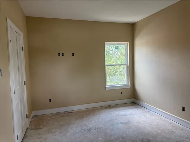 a bathroom with a sink and a window