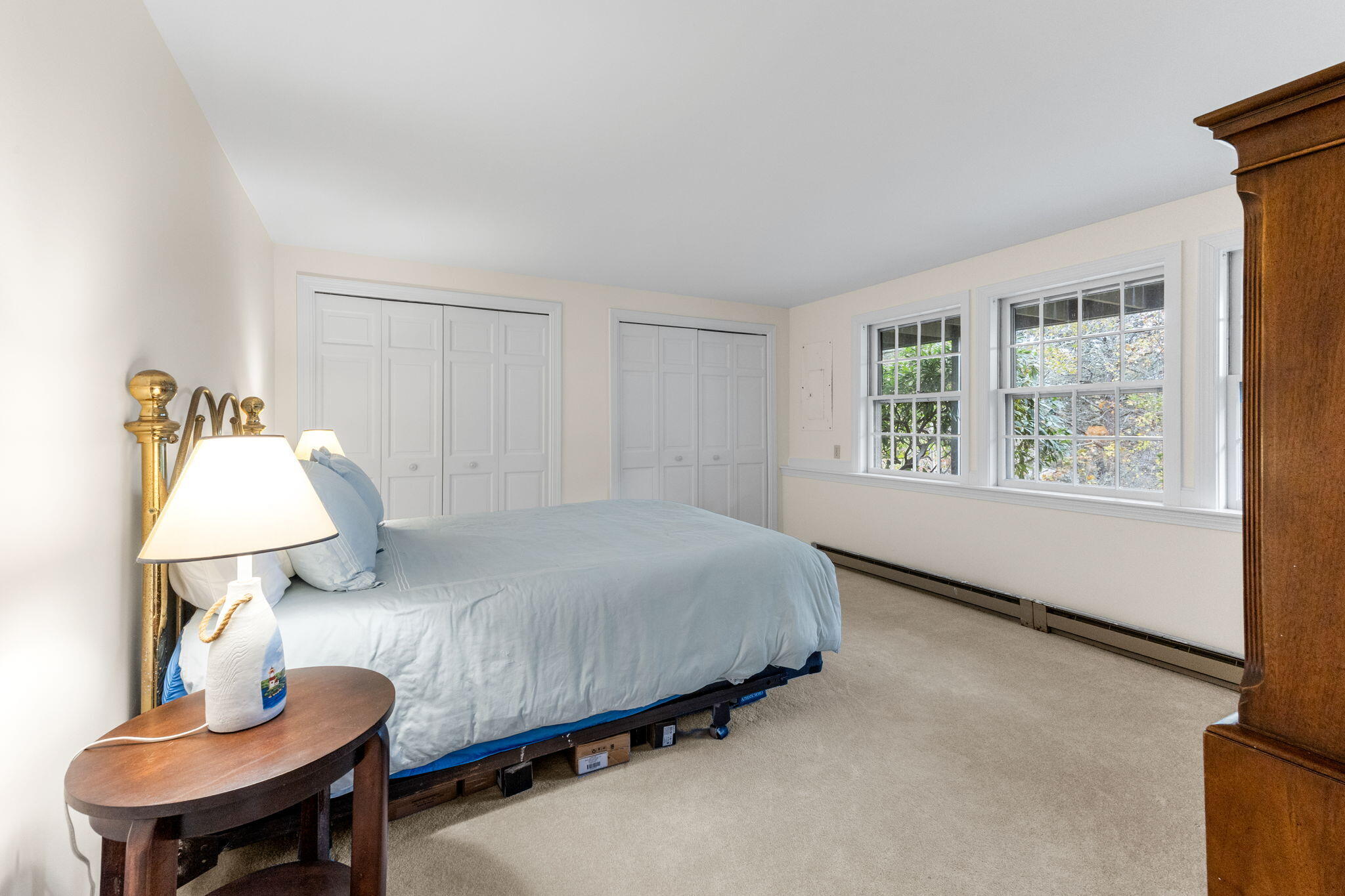 407 Orleans Road, Unit D North Chatham, MA 02650 - Photo 22 of 36 a bedroom with a bed and window