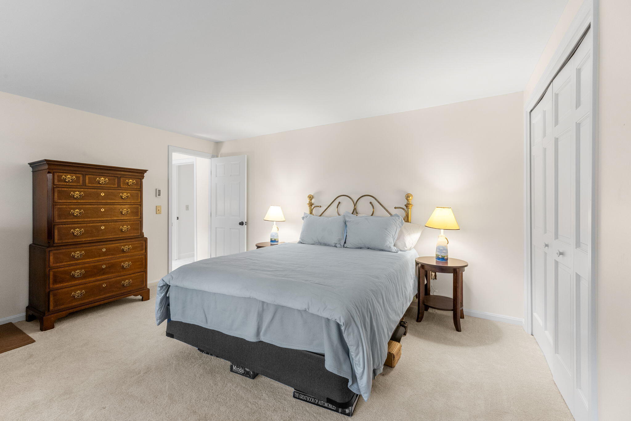 407 Orleans Road, Unit D North Chatham, MA 02650 - Photo 23 of 36 a bedroom with a bed and a closet