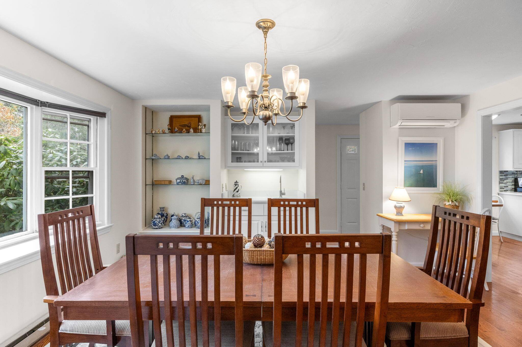 407 Orleans Road, Unit D North Chatham, MA 02650 - Photo 5 of 36 a view of a dining room with furniture window and outside view