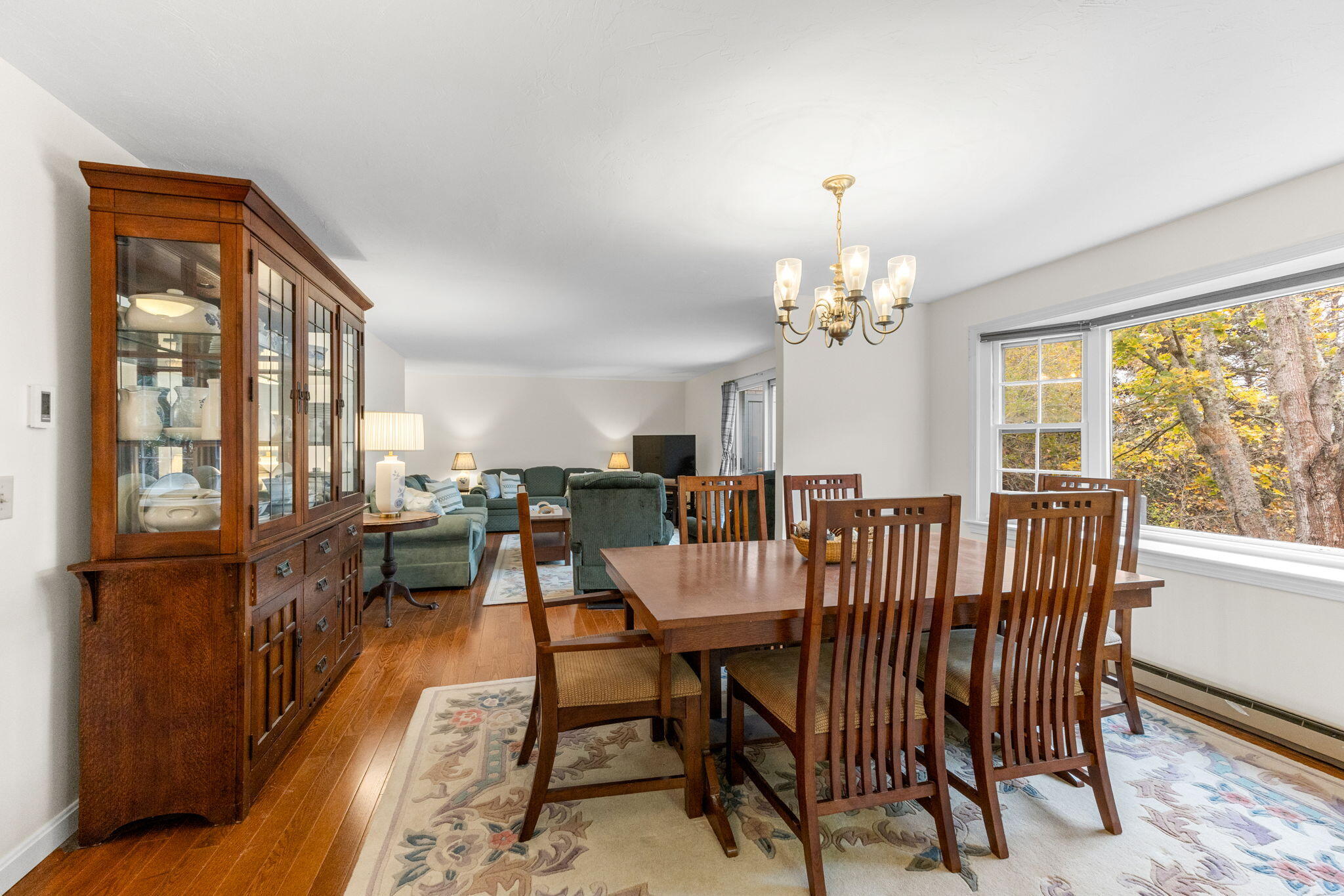 407 Orleans Road, Unit D North Chatham, MA 02650 - Photo 7 of 36 a view of a dining room with furniture window and outside view