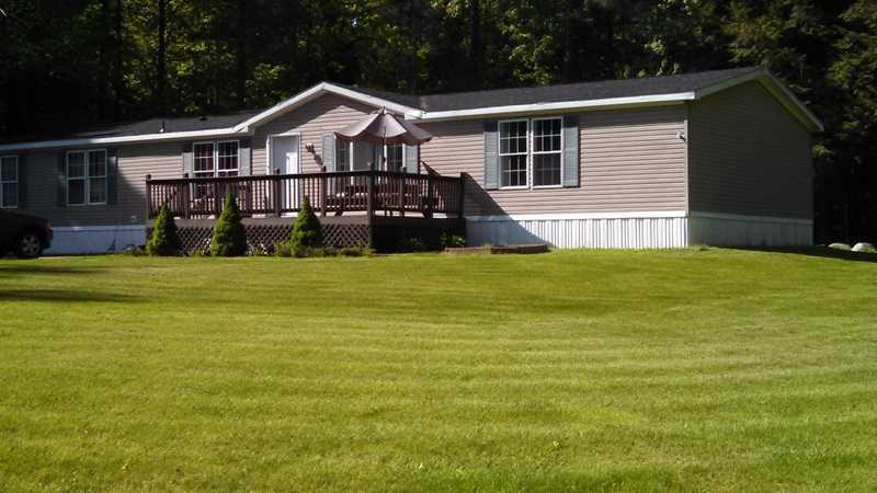 59 McGrath Pond Road Oakland, ME 04963 - Photo 1 of 33 Exterior Front.