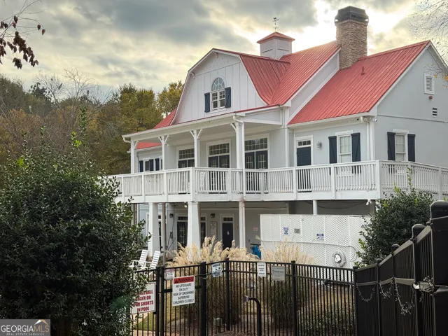 a view of empty space with large trees