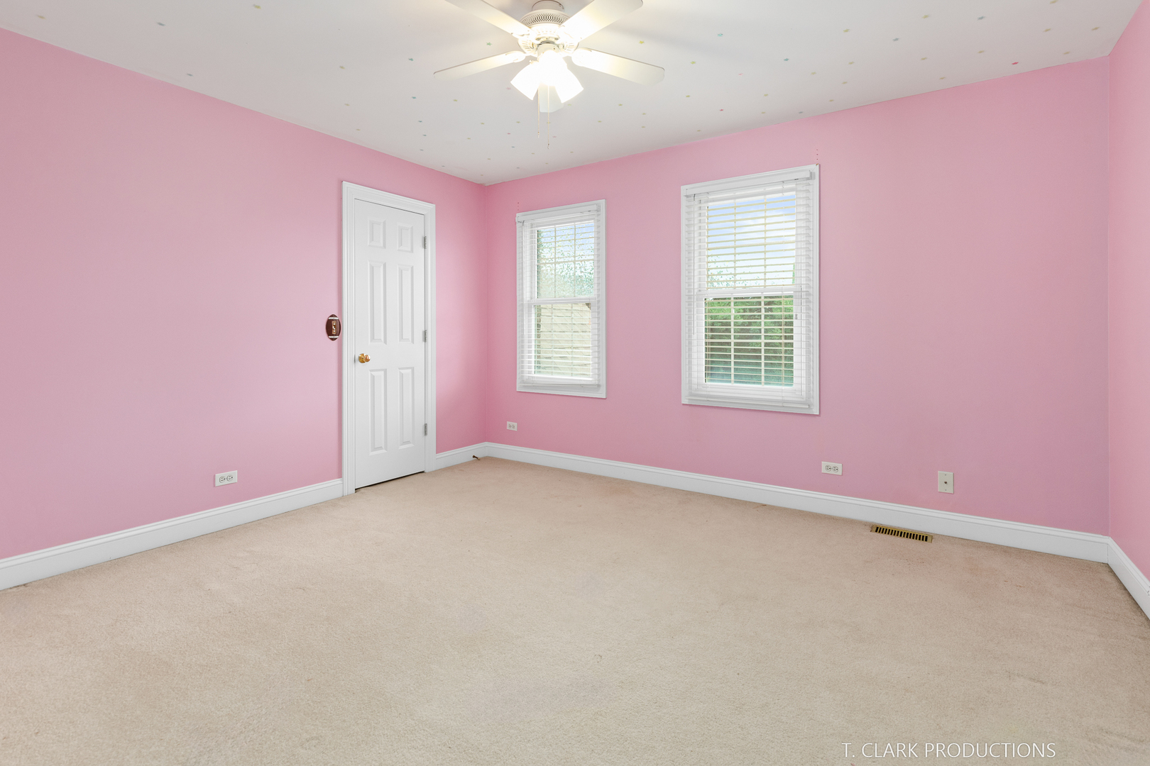2724 Wait Road Naperville, IL 60564 - Photo 22 of 24 an empty room with windows and chandelier fan