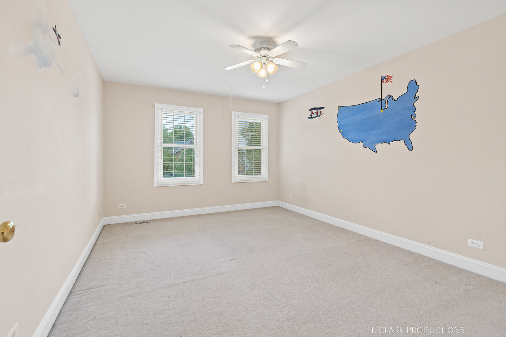 2724 Wait Road Naperville, IL 60564 - Photo 23 of 24 an empty room with a ceiling fan and a window