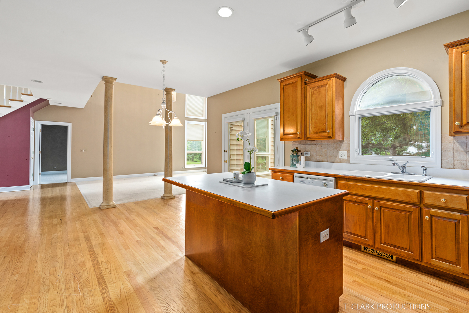 2724 Wait Road Naperville, IL 60564 - Photo 10 of 24 a kitchen with stainless steel appliances granite countertop a sink stove and wooden cabinets