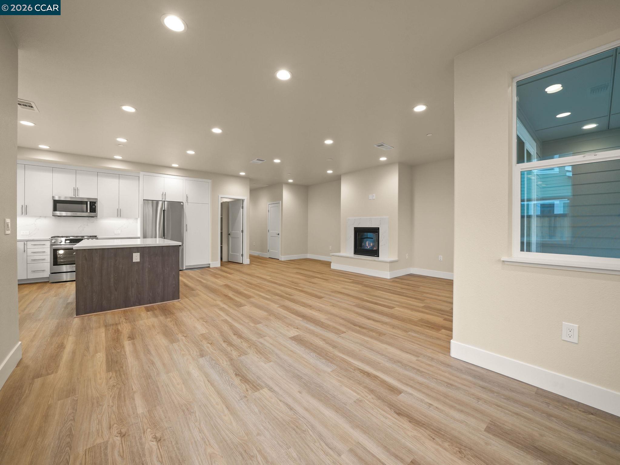 3030 Byron Road Tracy, CA 95377 - Photo 14 of 58 a view of kitchen with kitchen island sink and center island