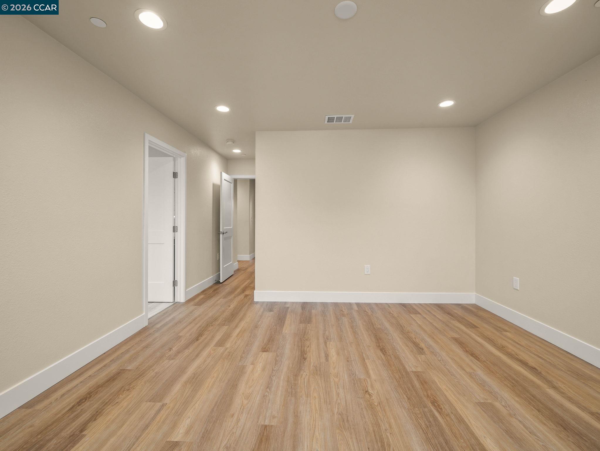 3030 Byron Road Tracy, CA 95377 - Photo 26 of 58 a view of hallway with wooden floor