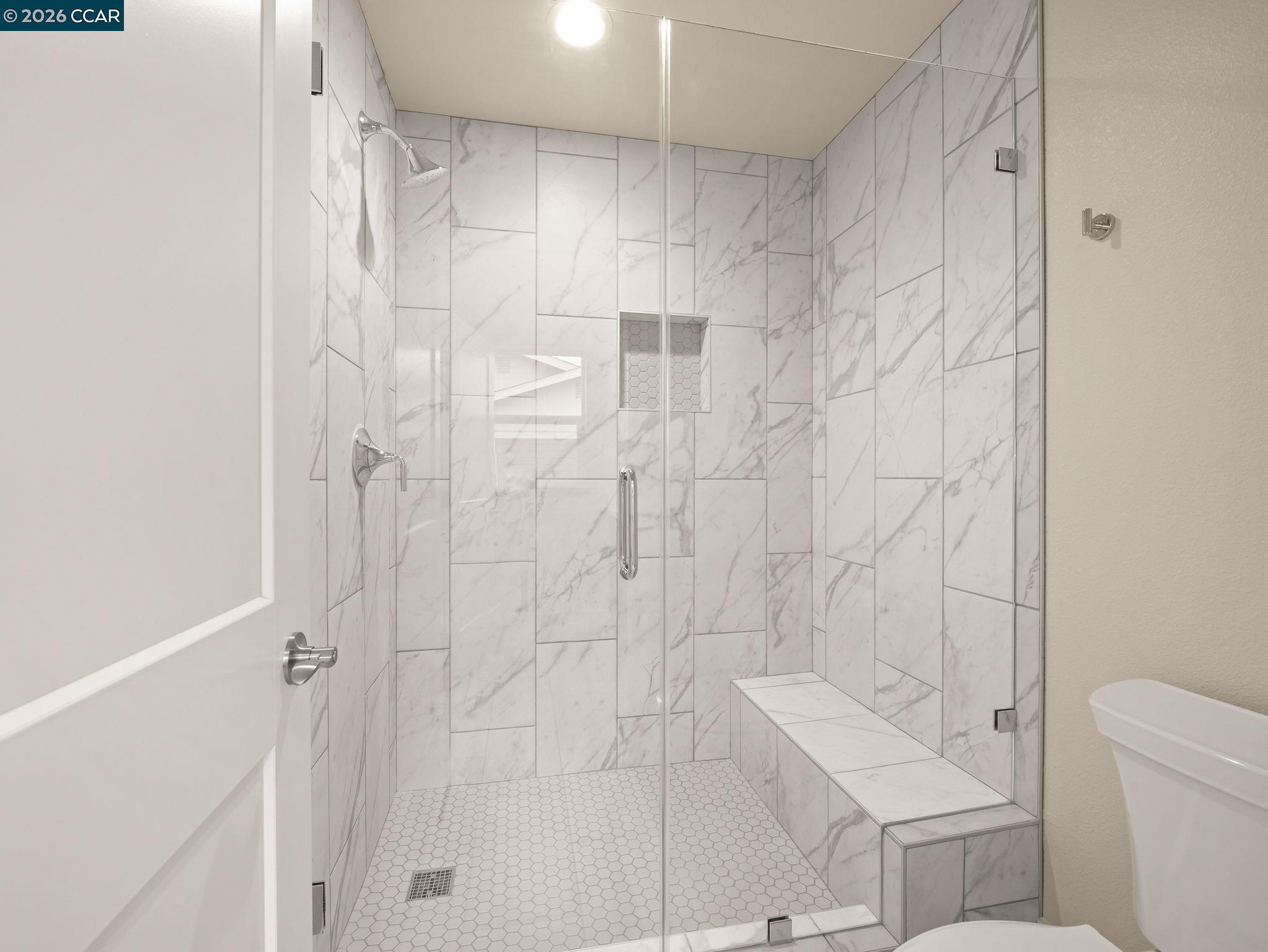 3030 Byron Road Tracy, CA 95377 - Photo 32 of 58 a bathroom with a shower a toilet and a sink
