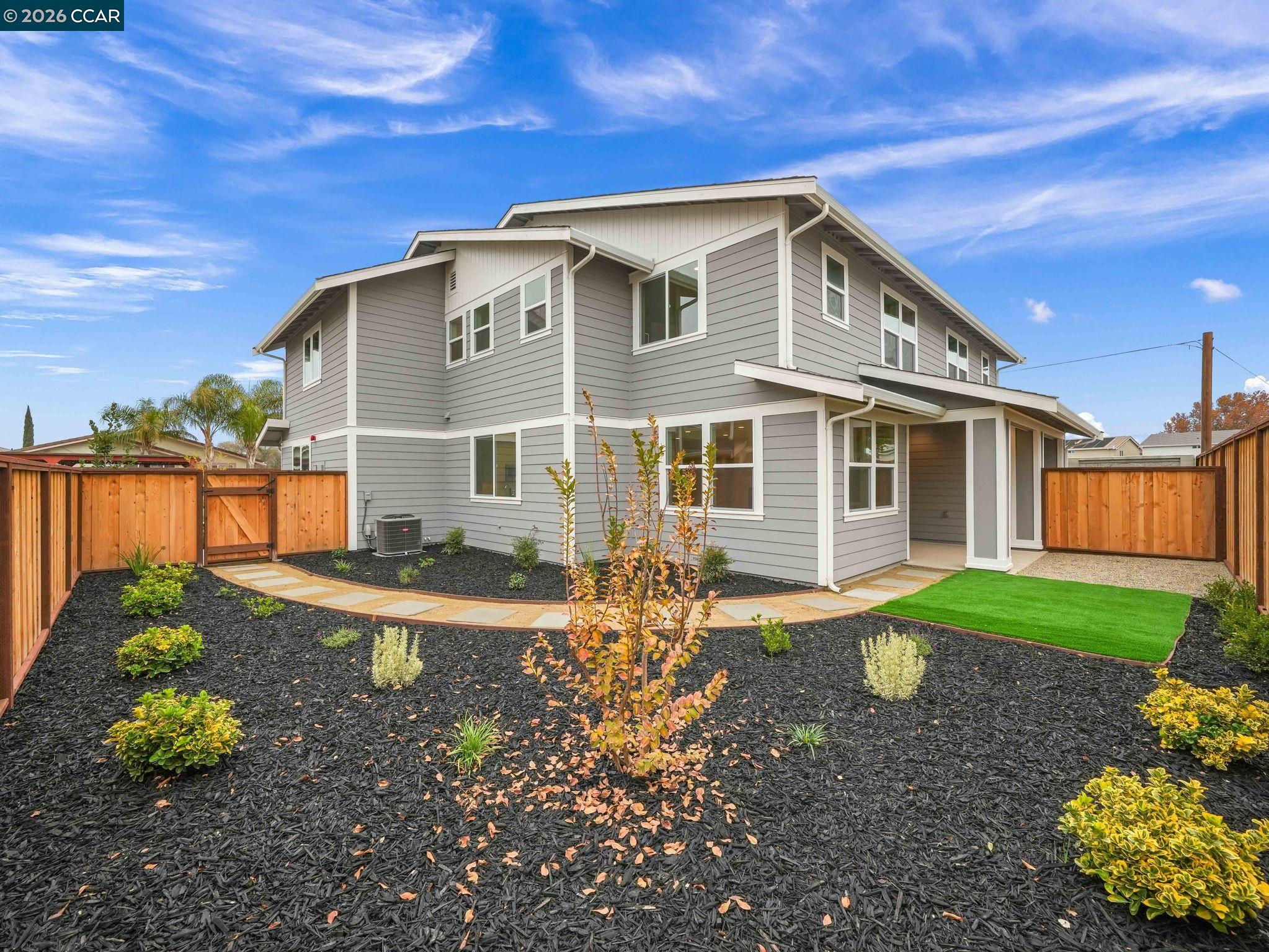 3030 Byron Road Tracy, CA 95377 - Photo 43 of 58 a view of a house with a yard