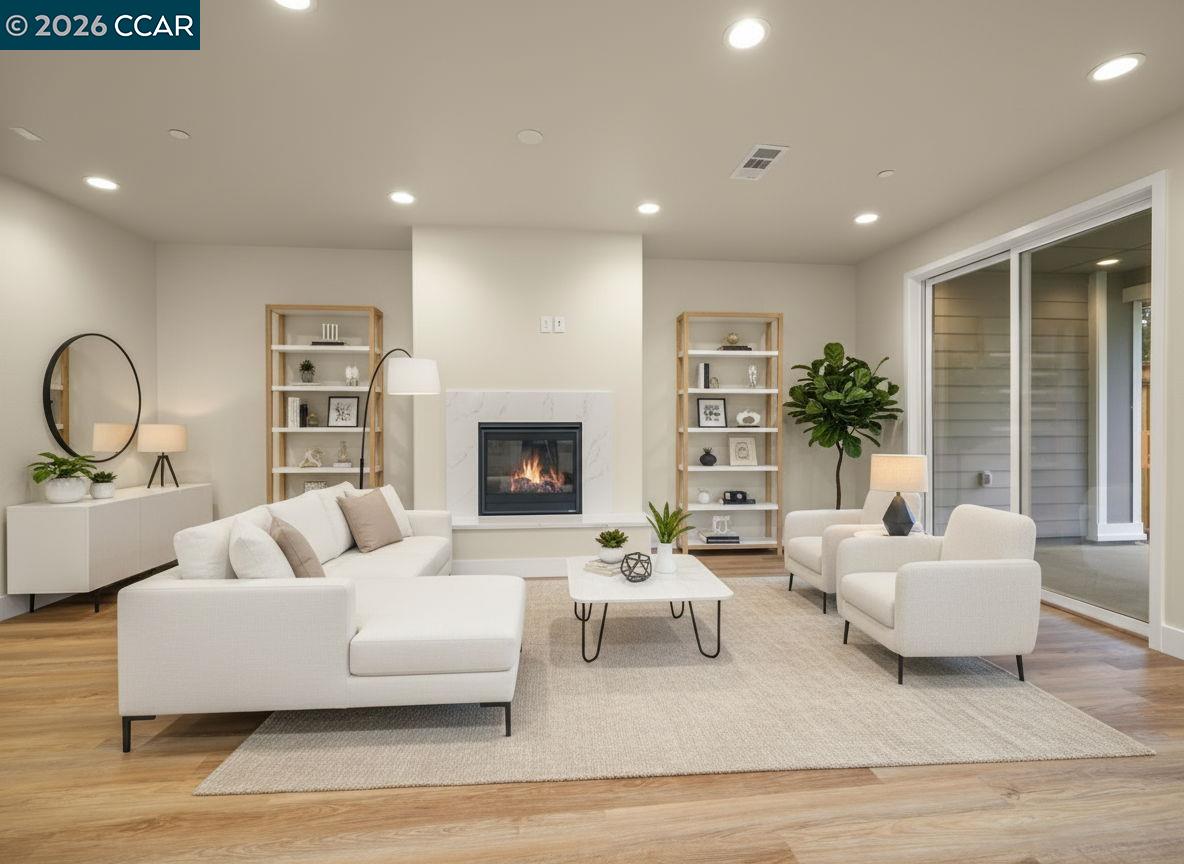 3030 Byron Road Tracy, CA 95377 - Photo 5 of 58 a living room with furniture and a fireplace
