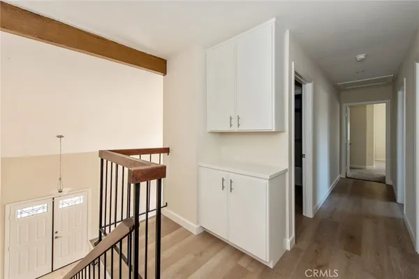 a view of a hallway with entryway