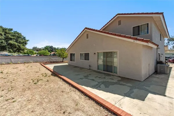 a view of a house with a snow in the yard