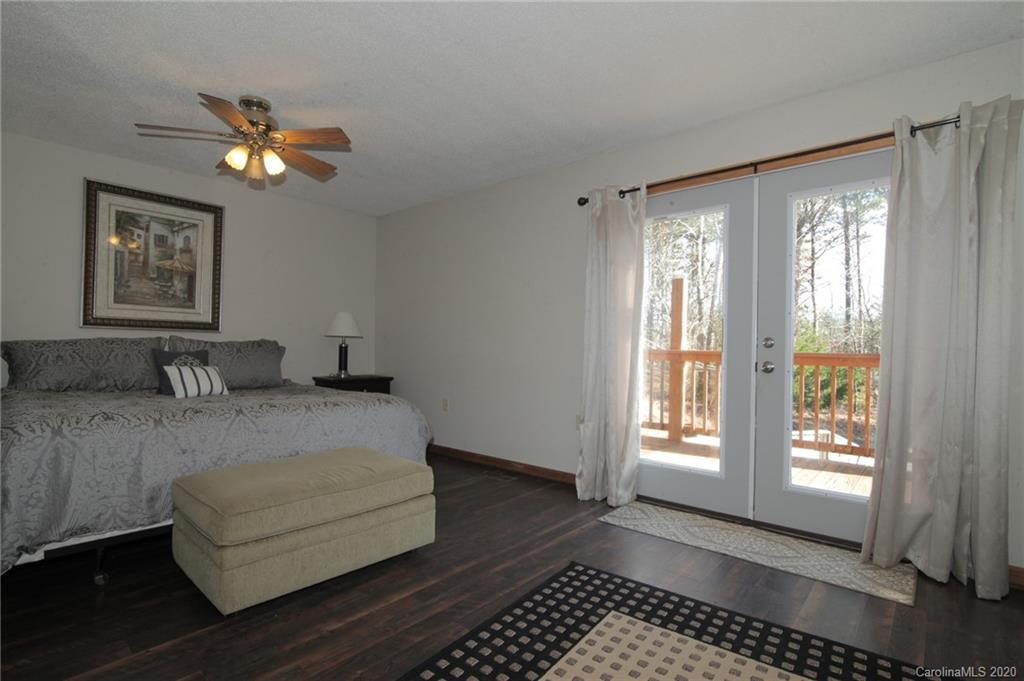 268 Painter Road Mill Spring, NC 28756 - Photo 16 of 41 a living room with furniture and a window