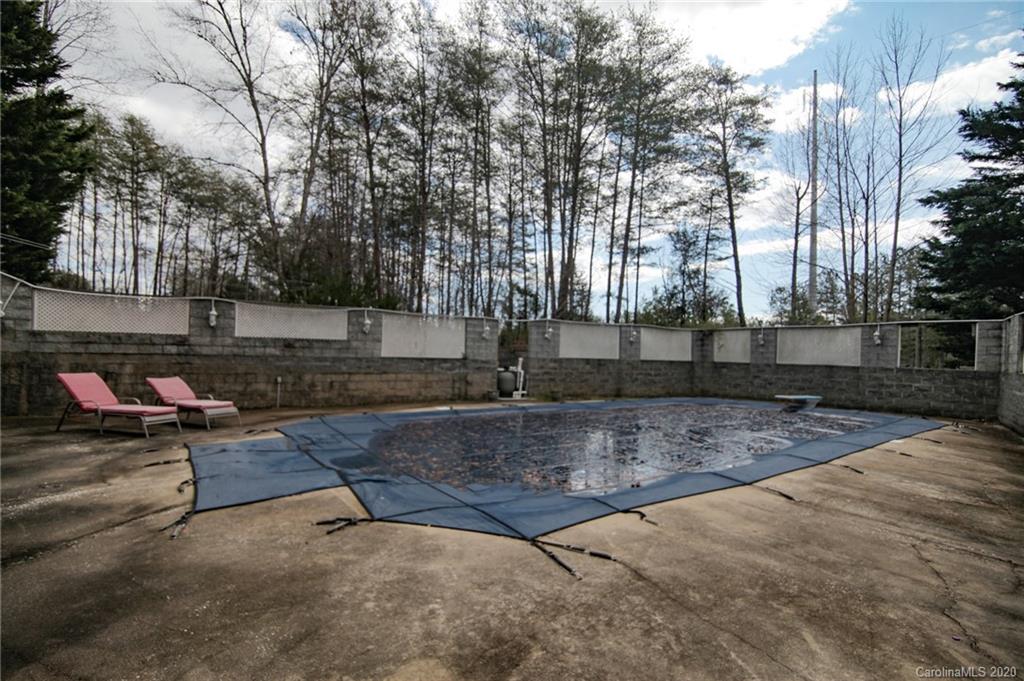 268 Painter Road Mill Spring, NC 28756 - Photo 32 of 41 a backyard of a house with lots of green space