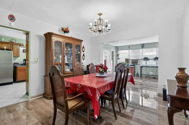 a view of a dining room with furniture