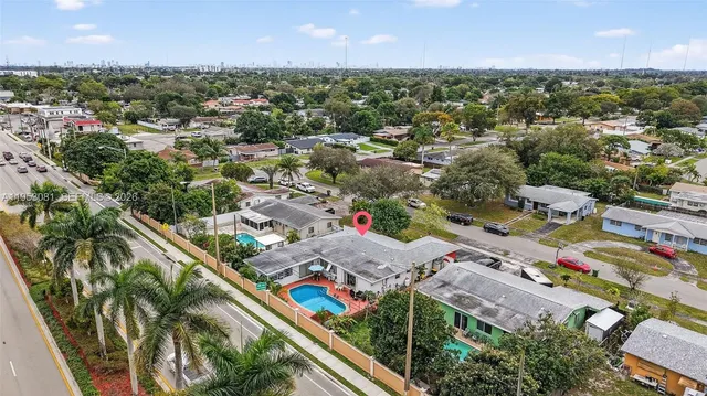an aerial view of a city with lots of residential buildings