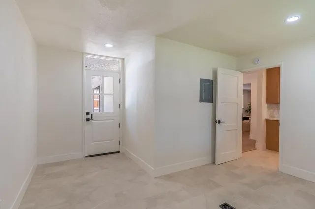 a bedroom with a bed and furniture