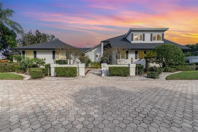 a view of a patio with a table and chairs