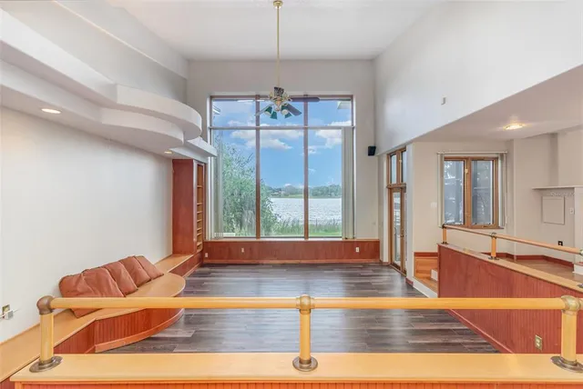 a kitchen with stainless steel appliances granite countertop white cabinets sink and stove