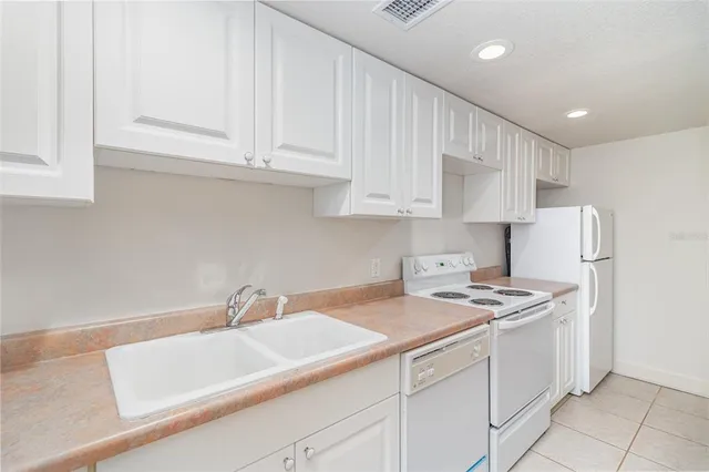 a view of a swimming pool with a lake view