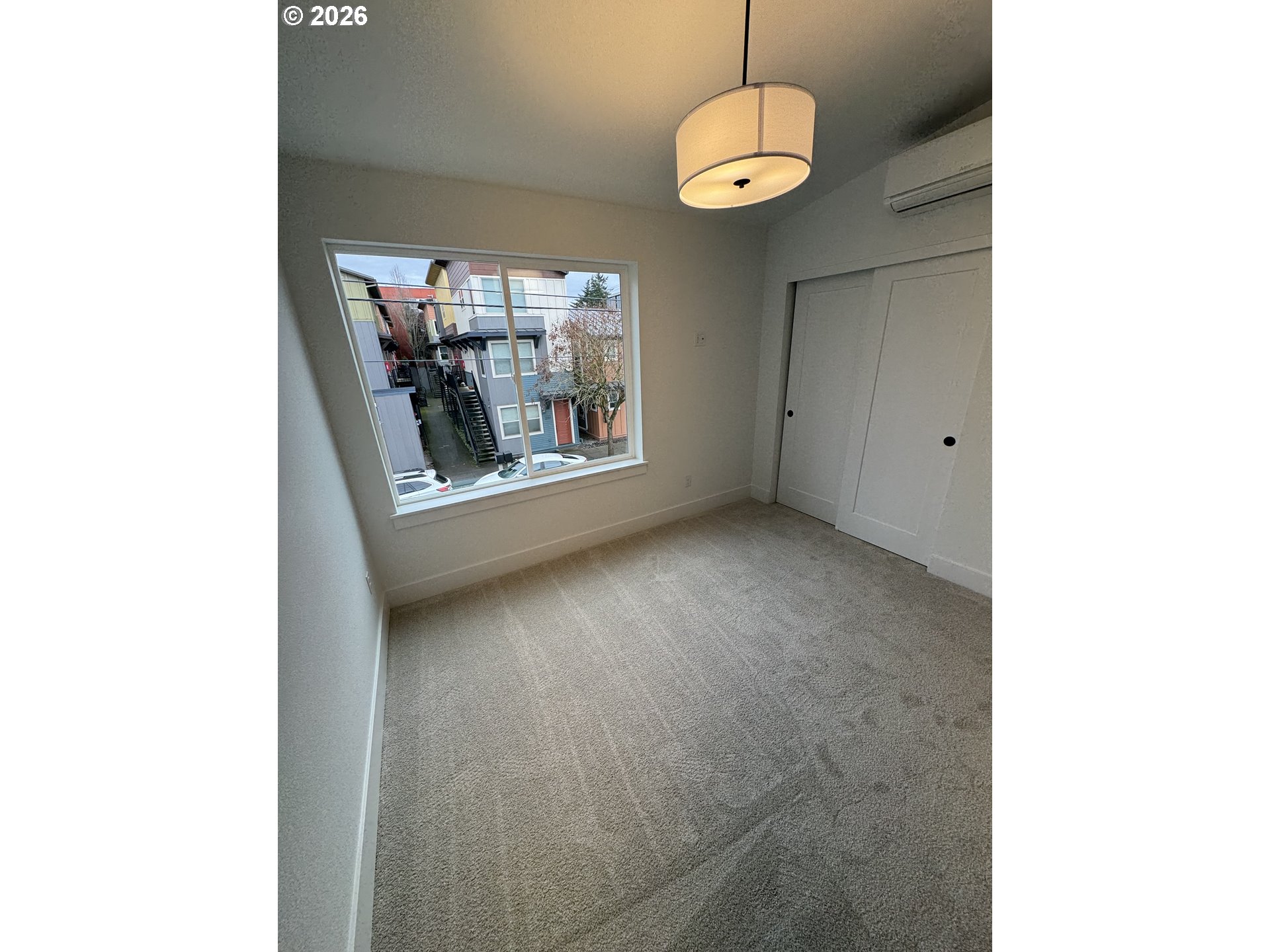 2383 Southeast 43rd Avenue Portland, OR 97206 - Photo 13 of 24 a view of a livingroom with a chandelier