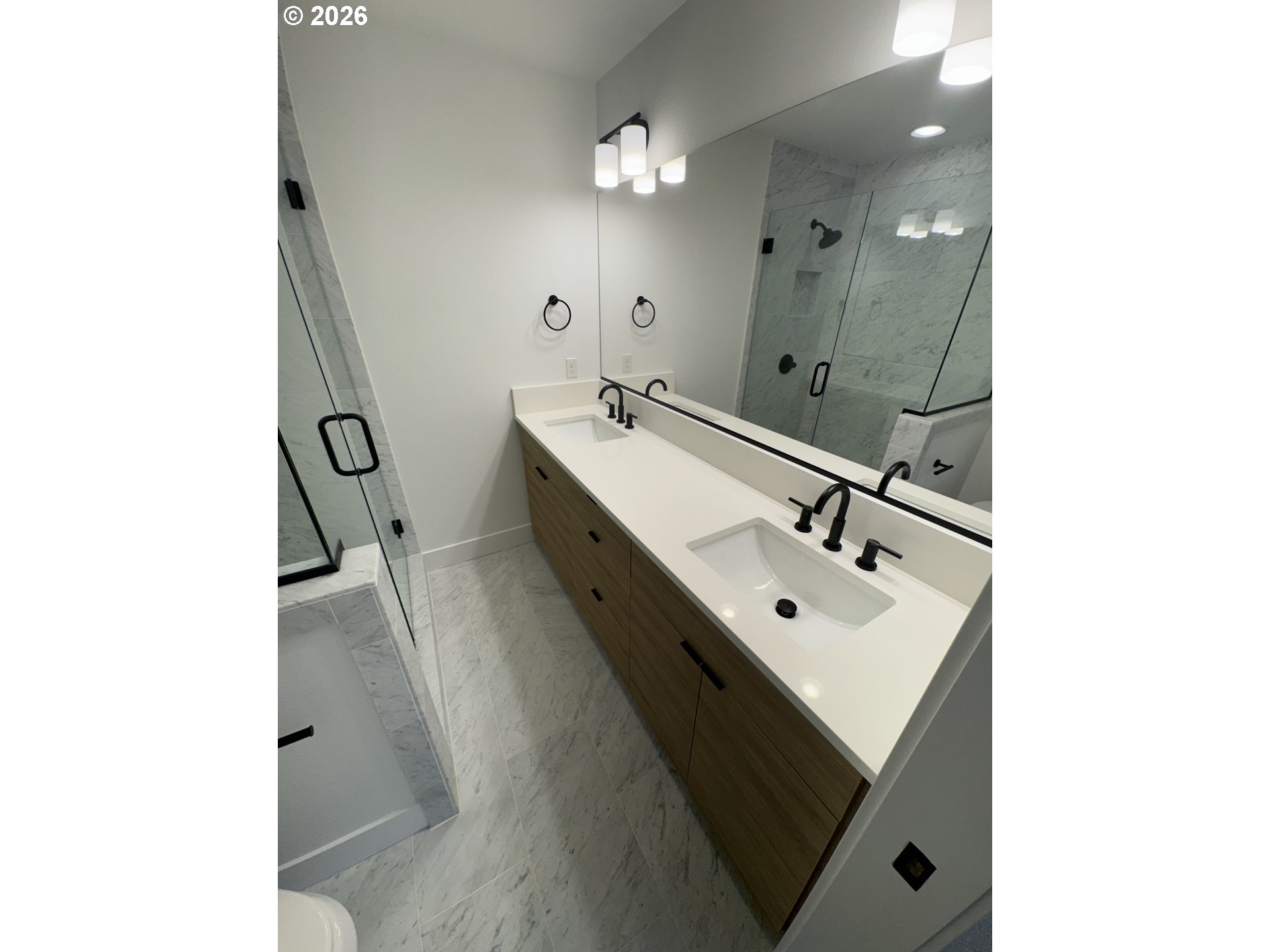2383 Southeast 43rd Avenue Portland, OR 97206 - Photo 14 of 24 a bathroom with a sink a mirror and a bathtub
