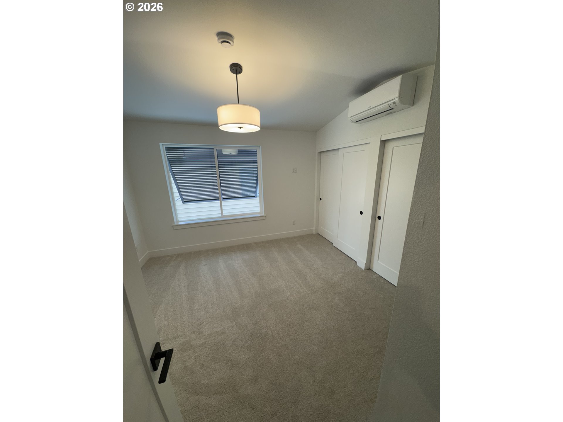 2383 Southeast 43rd Avenue Portland, OR 97206 - Photo 23 of 24 a view of an empty room with a window