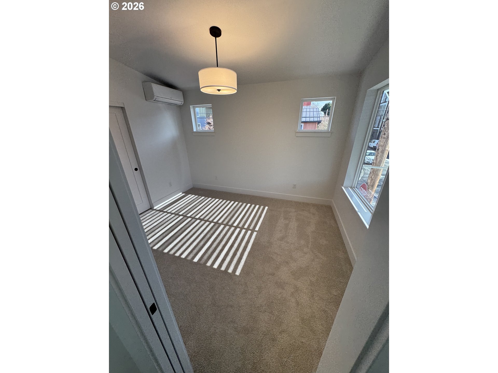 2383 Southeast 43rd Avenue Portland, OR 97206 - Photo 8 of 24 a view of an empty room with a window