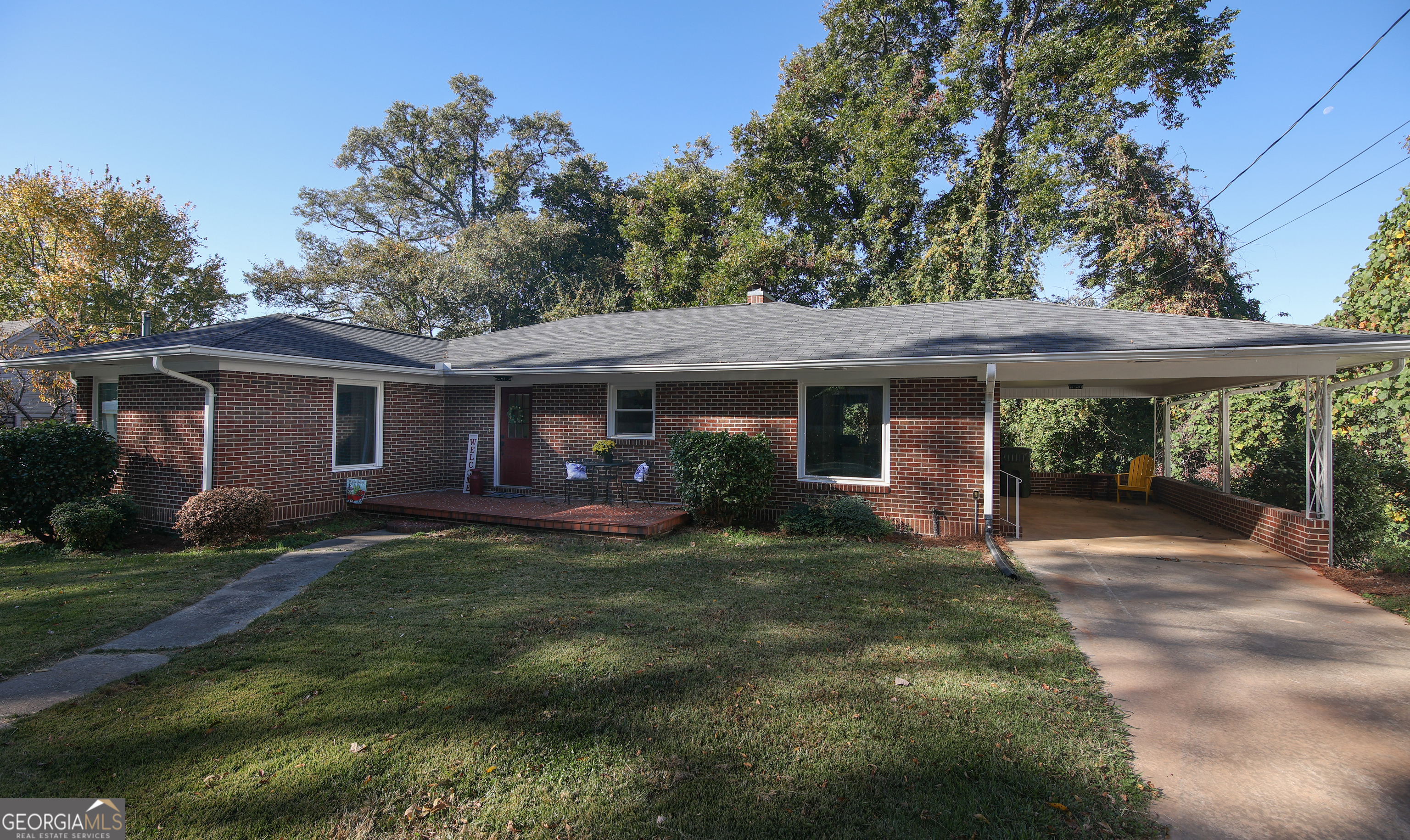 36 Park Street Toccoa, GA 30577 - Photo 1 of 1 a front view of a house with a garden