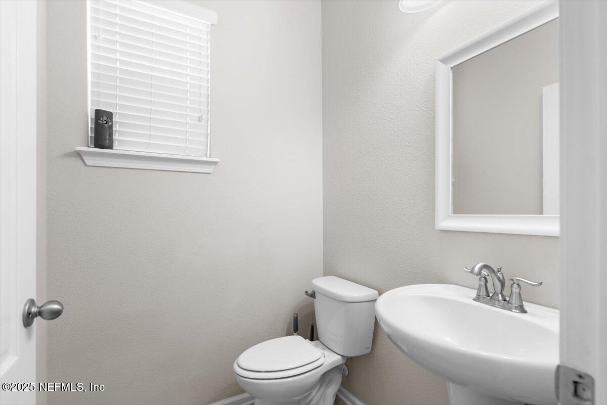 1011 Wetland Ridge Circle Middleburg, FL 32068 - Photo 10 of 72 14-First Floor Half Bathroom