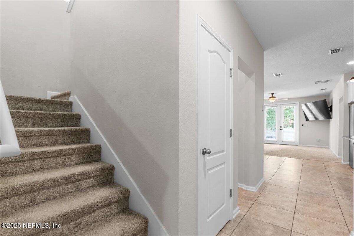 1011 Wetland Ridge Circle Middleburg, FL 32068 - Photo 10 of 73 a view of entryway and hall with wooden floor