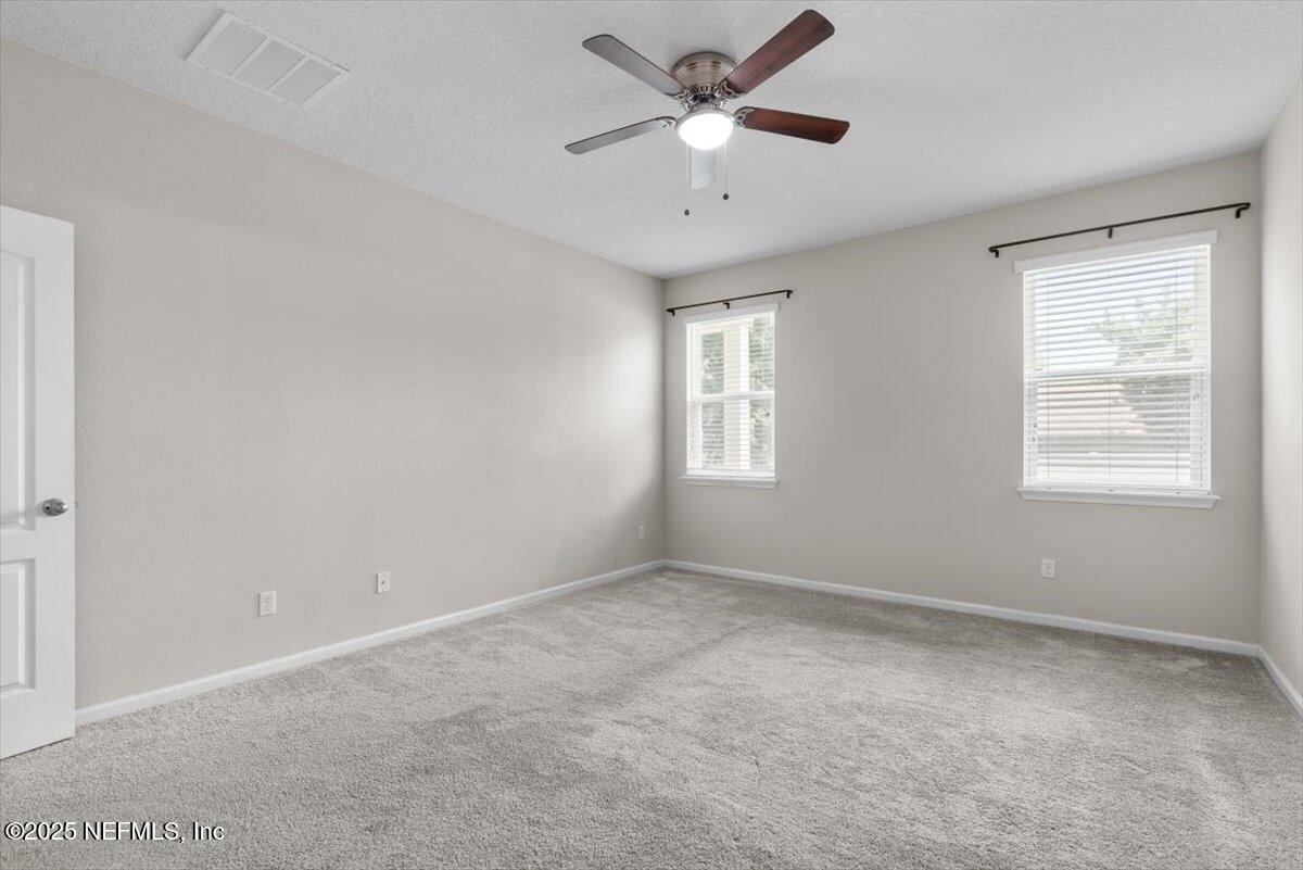 1011 Wetland Ridge Circle Middleburg, FL 32068 - Photo 26 of 73 a view of an empty room with a window
