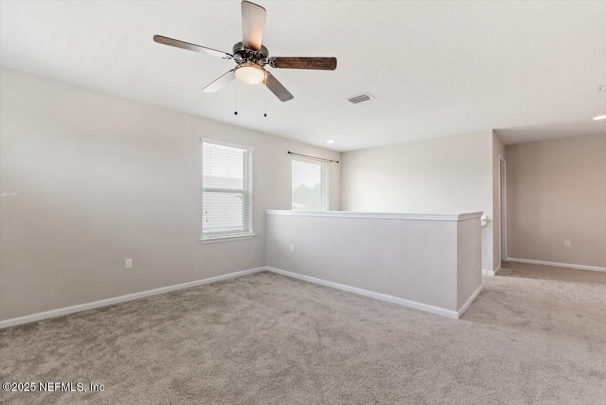 1011 Wetland Ridge Circle Middleburg, FL 32068 - Photo 32 of 73 a view of an empty room with a window