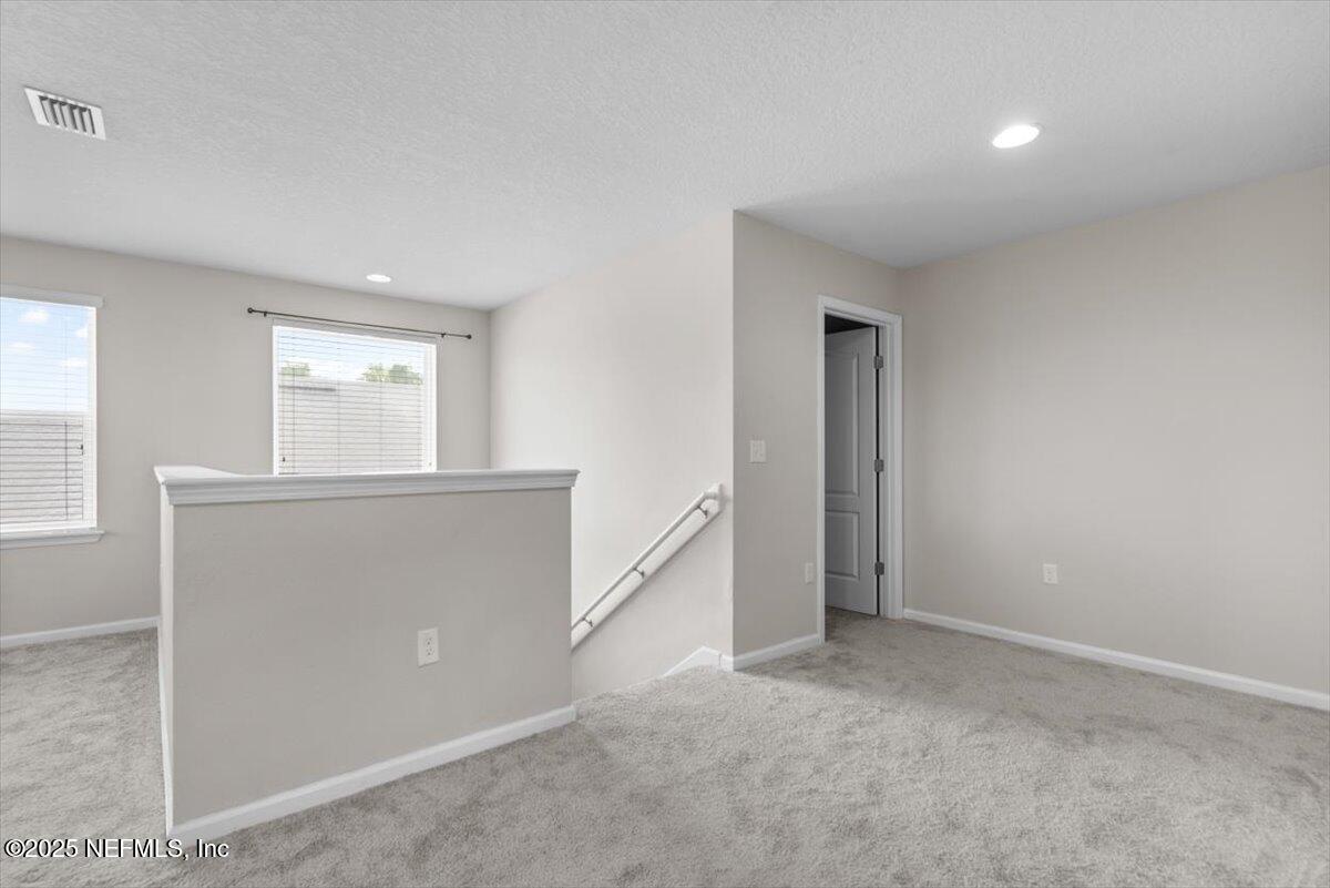 1011 Wetland Ridge Circle Middleburg, FL 32068 - Photo 33 of 73 49-Upstairs Loft to Closet