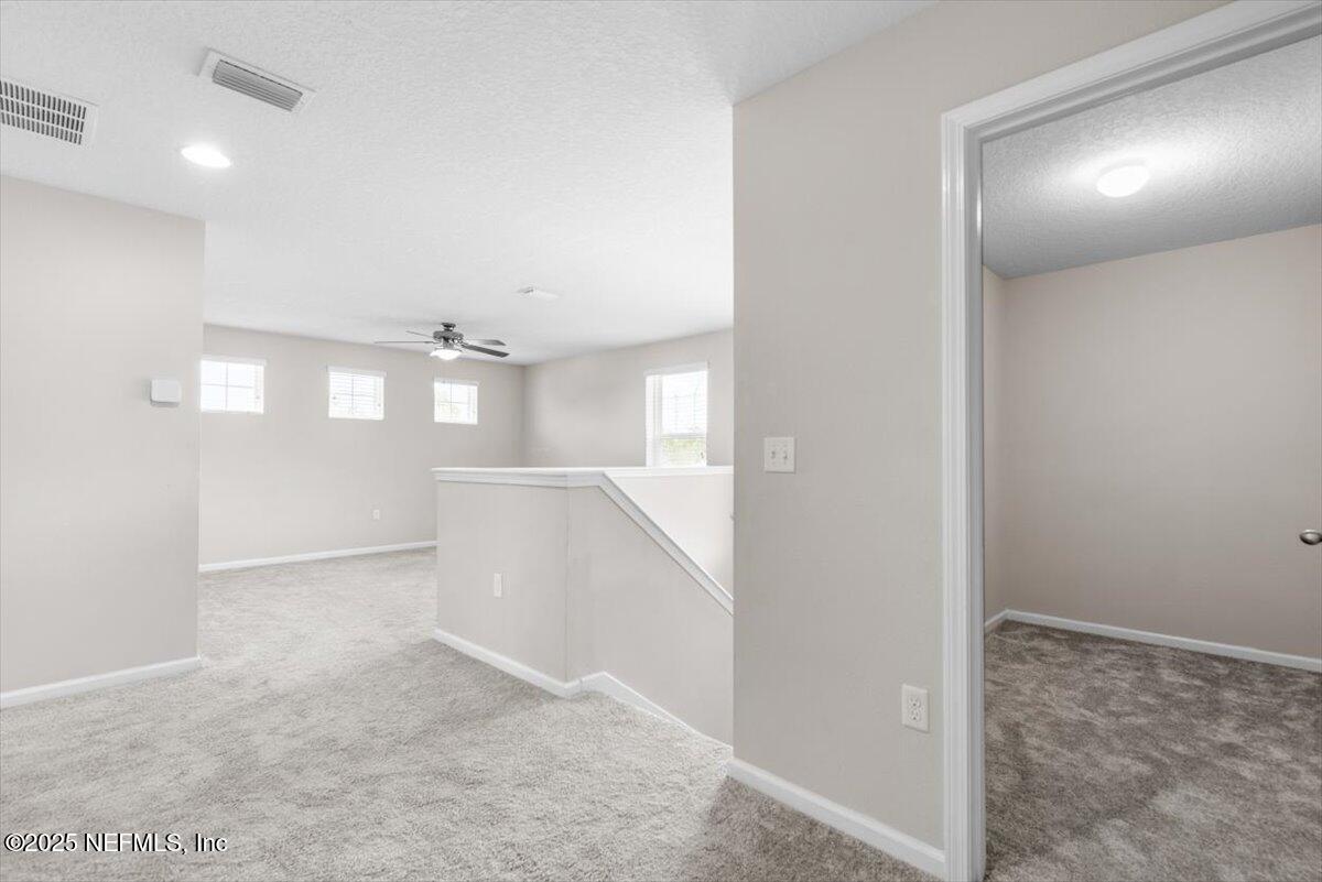 1011 Wetland Ridge Circle Middleburg, FL 32068 - Photo 33 of 72 42-Upstairs Loft to Extra Storage Closet