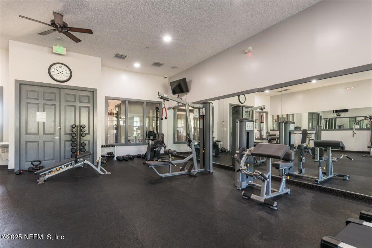 1011 Wetland Ridge Circle Middleburg, FL 32068 - Photo 65 of 73 a view of a room with gym equipment