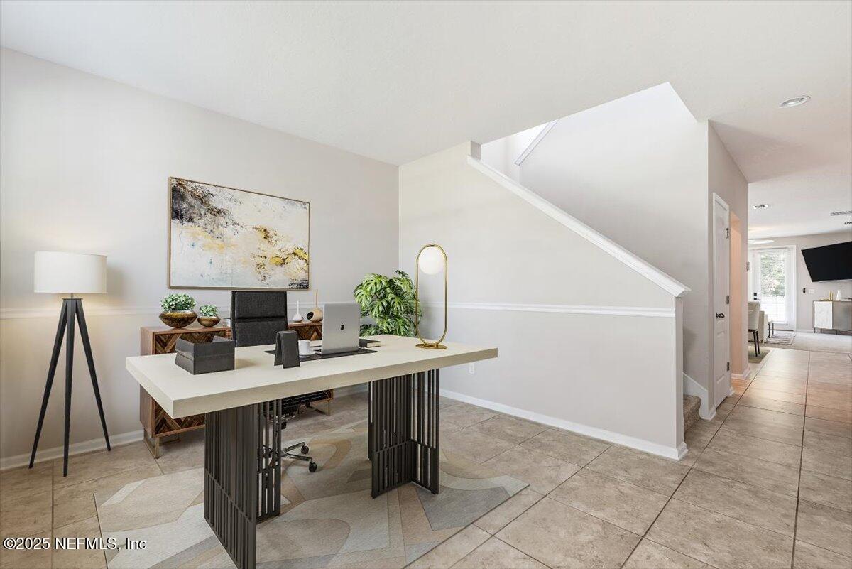 1011 Wetland Ridge Circle Middleburg, FL 32068 - Photo 6 of 73 a view of a workspace with furniture