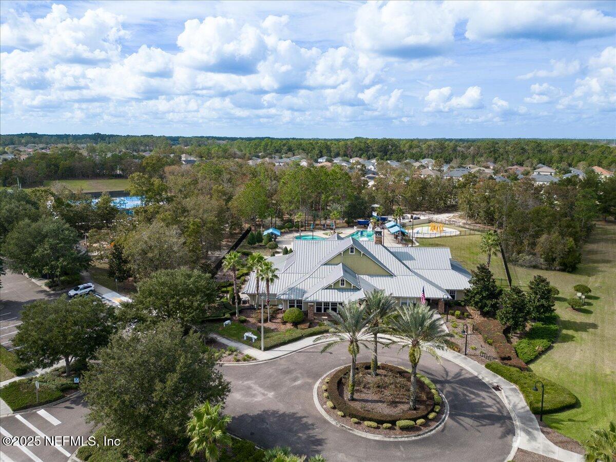 1011 Wetland Ridge Circle Middleburg, FL 32068 - Photo 71 of 73 a view of a lake with a building in the background